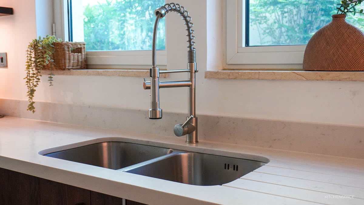 Walnut Kitchen with Geometric Backsplash